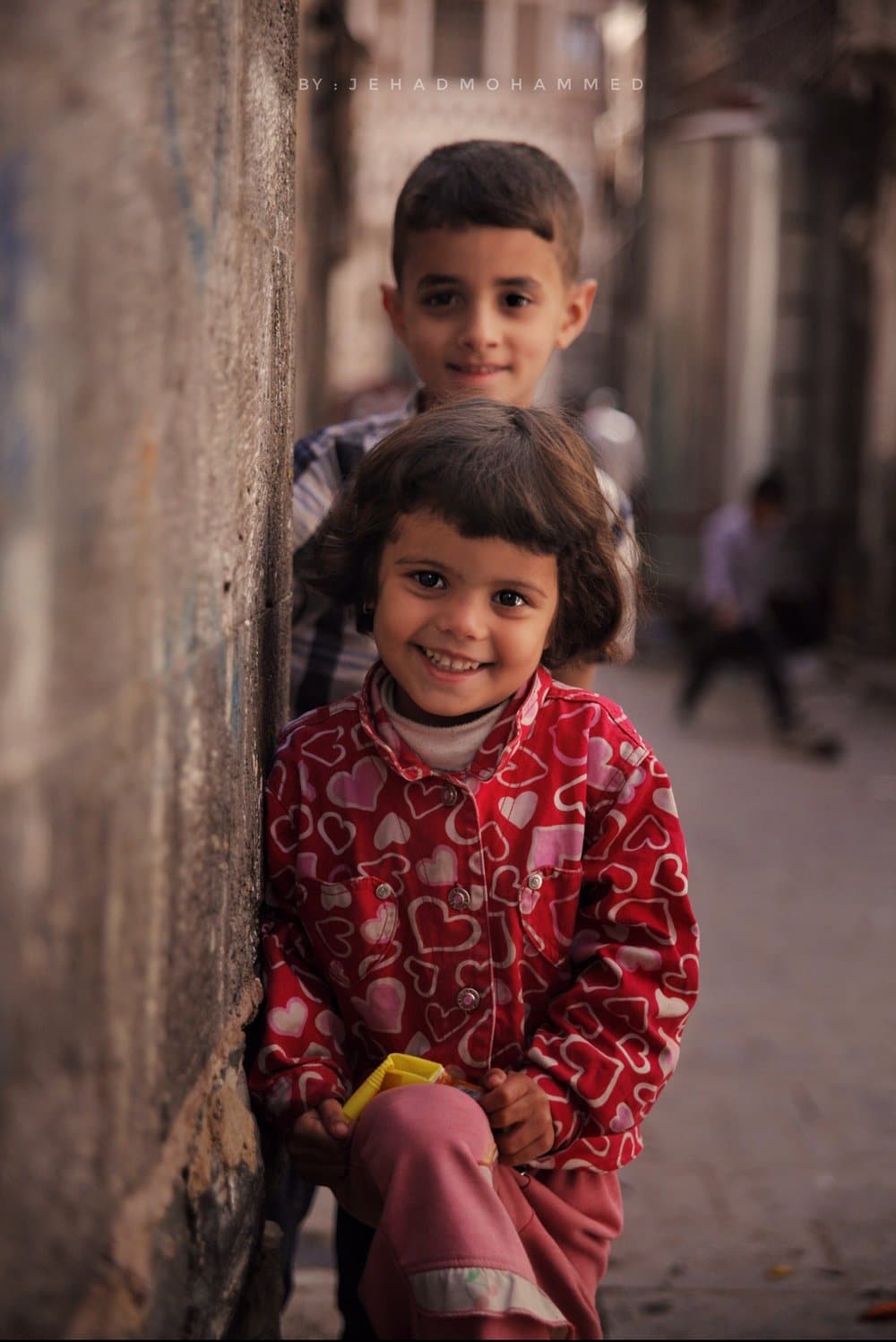 Faces of Two children in the Streets of Old Sanaa City - Jehad